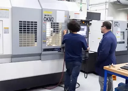 Madison College CNC technician student in lab