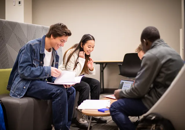 A diverse group of students talks about college life.