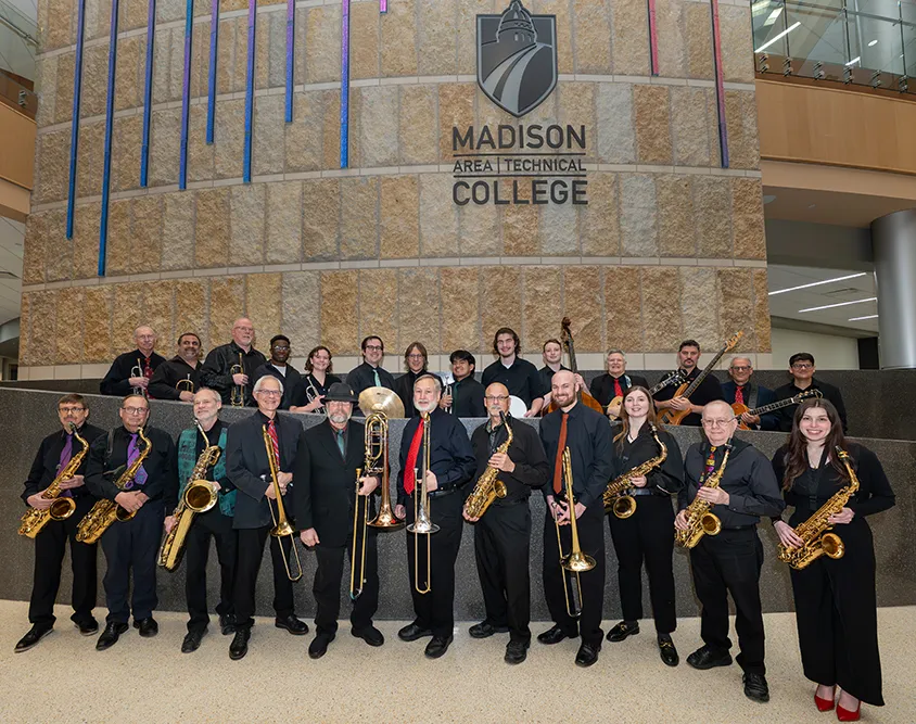 Members of the 2025 Big Band posing in the Truax Gateway
