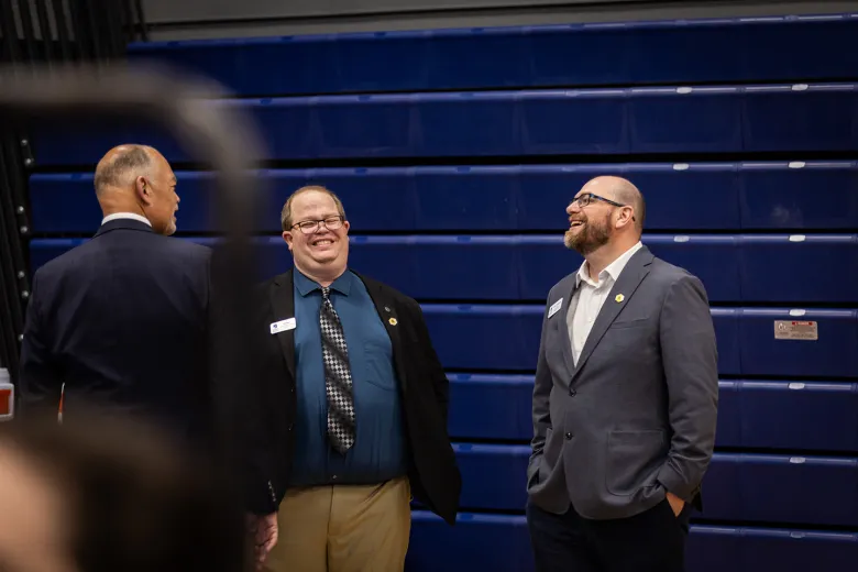 Three people laughing