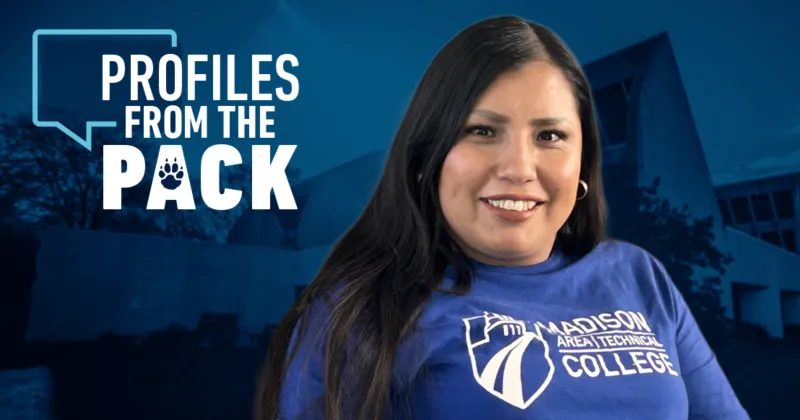Marisela Harkins, Madison College ESL Success Story, wearing blue T-shirt with Madison College logo, standing in front of an image of the Portage campus with trees.