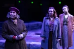 Three women of varying ages in a scene from Women of Lockerbie
